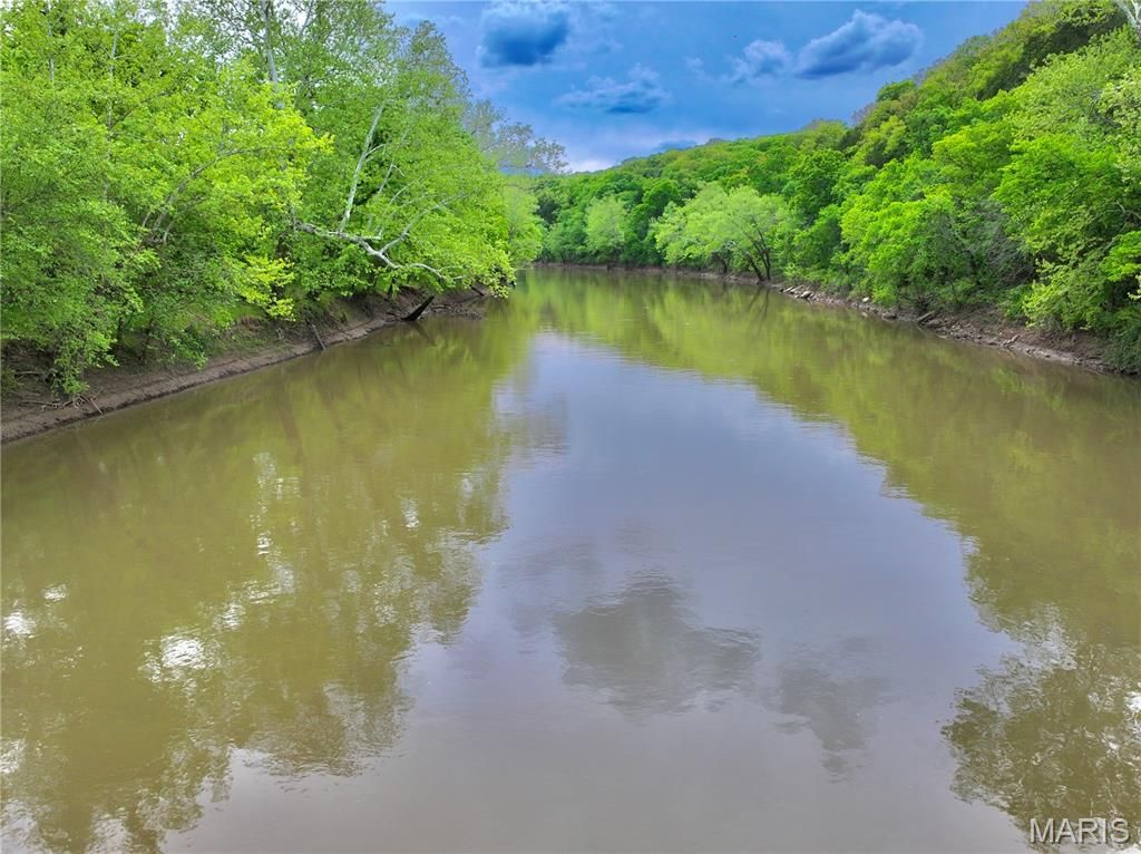 Photo of TBD SE 800 Rd. T18, Collins, MO 64738 (MLS # 26025824)