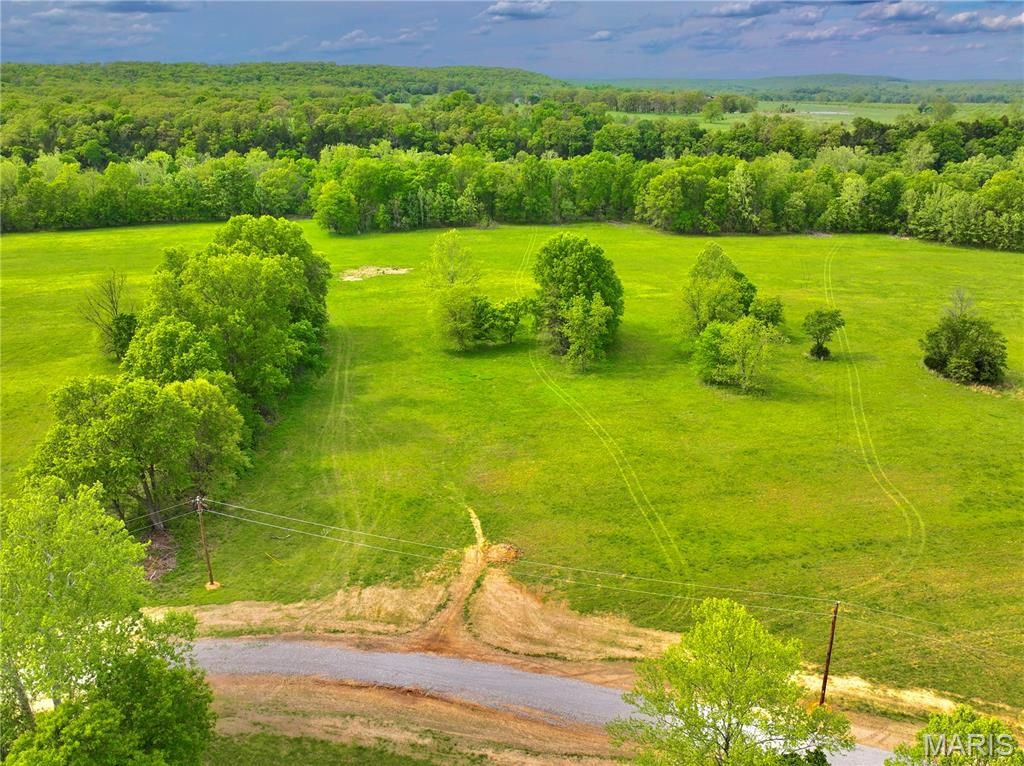 Photo of TBD SE 800 Rd. T18, Collins, MO 64738 (MLS # 26025824)