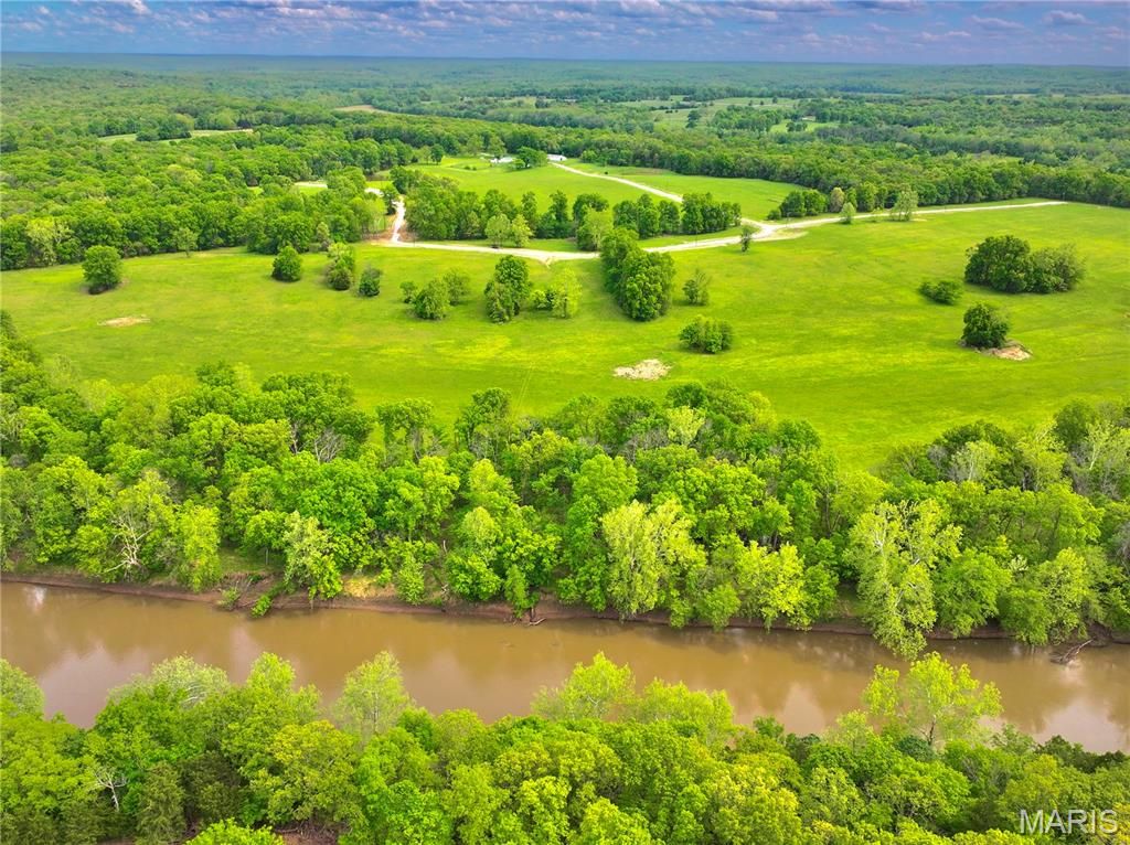 Photo of TBD SE 800 Rd. T18, Collins, MO 64738 (MLS # 26025824)