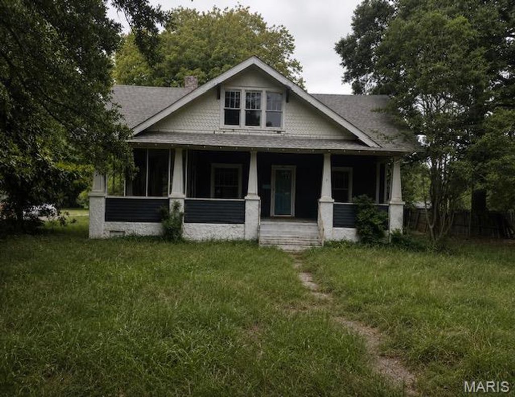 Photo of 110 W Cleveland Street, Malden, MO 63863 (MLS # 26028524)