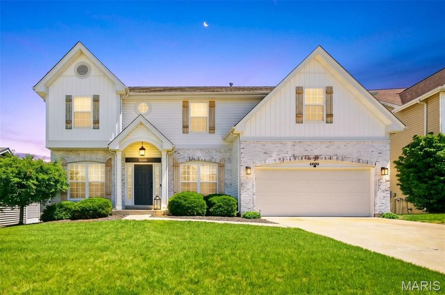 Space, style, and sophistication await at 4006 Riverdell Dr! This beautiful 2-story home features 9ft ceilings and wide-plank flooring throughout the main level. The open-concept kitchen and breakfast room provide ample storage and counter space, leading directly to a private deck perfect for morning coffee or evening BBQs. Upstairs, you'll find four large bedrooms plus a versatile loft with vaulted ceilings—ideal for a home office or playroom. The master suite is a private oasis with an updated bath including a separate soaking tub and glass-enclosed shower. Convenience is key with a second-floor laundry room and a 2-car attached garage. Head to the finished lower level featuring a full custom wet bar and family/rec room that walks out to a private covered patio with ceiling fans and wired speakers. Located in the top-rated Wentzville R-IV school district, this home is move-in ready and waiting for you! Come see it before it's too late.