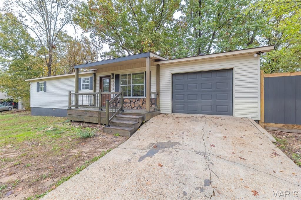Photo of 3338 Jimmy Lane, Poplar Bluff, MO 63901 (MLS # 25073471)