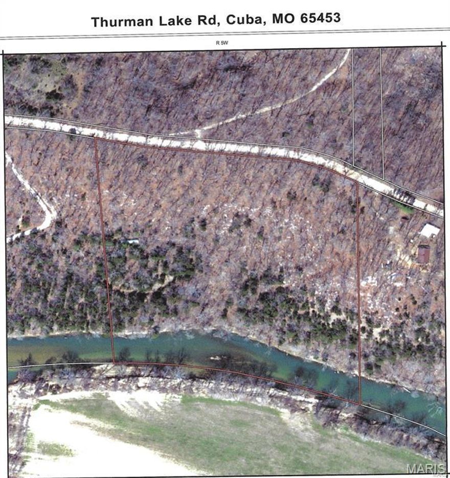 RECENTLY SURVEYED! JUST REDUCED!! MERAMEC RIVER WATERFRONT! 10 acres m/l with ~650' of Meramec Riverfront. 90 Miles to St. Louis, 10 minutes to I-44, 15 minutes to St. James or Cuba. Near Scotts Ford Access. Fisherman’s paradise in Red Ribbon Trout Area and Smallmouth Bass Special Management Area. Boat, canoe or kayak. Variety of wildlife including deer and turkeys. Most of parcel out of floodplain. Drilled well on property (not sure if functional). Unsure of a septic. Has an old single wide trailer on it that is probably not livable, has an electric pole on the property that is almost to the ground, so it appears to have an electrical source available. Has some marketable timber and you could sell the timber and build your dream house (a logging company asked to buy the trees last winter). Taxes $5.00 +/- year.
Put the following link in your website to watch the Drone video.
https://www.youtube.com/watch?v=Fgvj1CRKIMo