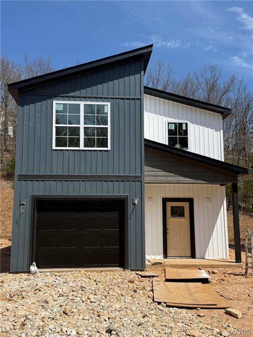 Introducing Pinnacle Park — Waynesville’s newest community! Be among the first to own in this exciting new neighborhood featuring stylish two story homes just minutes from Fort Leonard Wood and located within the Waynesville School District. Designed with both comfort and function in mind, this thoughtfully crafted floor plan offers 3 bedrooms, 2.5 bathrooms, and a one-car garage. Every home comes loaded with signature upgrades, including custom cabinetry, luxury vinyl plank flooring, quartz countertops, stainless steel appliances, white subway tile backsplash, epoxy-coated garage floors, and more! Designer finishes have already been selected, making the process simple, just choose your lot and move right in! Specific upgrades can still be accommodated such as a fence, fireplace, blinds & more. Construction is underway now with this lot's projected completion date in April 2026. Secure your NEW home now, contracts are being accepted now for all homes in the neighborhood. Schedule today to visit our model home! Photos are in likeness to be built and may vary on design, selection and features.