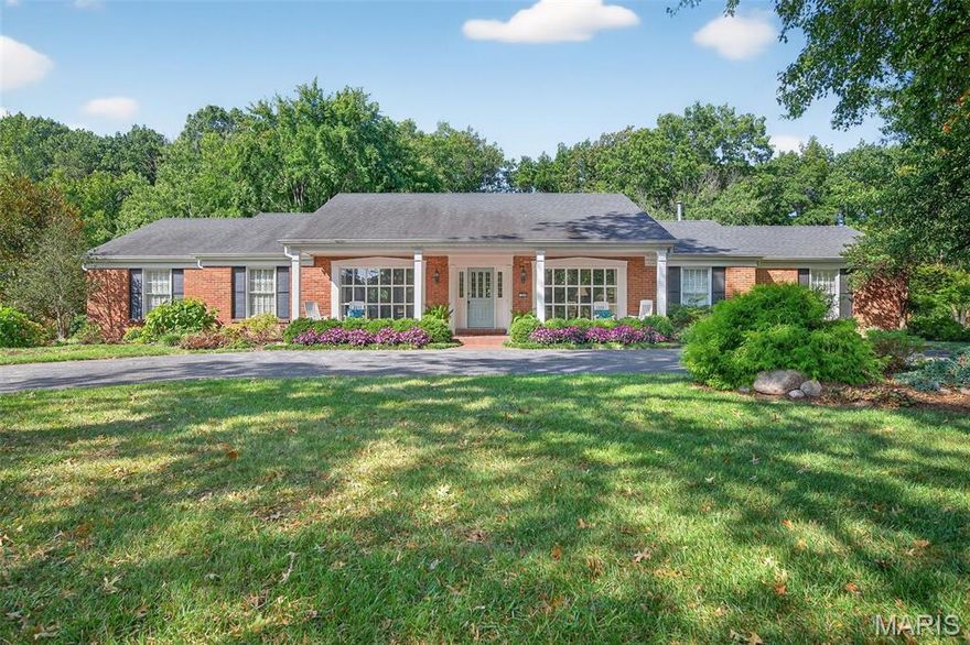 Tucked away in the sought-after Runnymede subdivision just east of 270 and off prestigious Ladue Road, this spacious all-brick ranch offers the perfect blend of timeless elegance and everyday functionality. Situated on a beautifully landscaped lot backing to woods, this home features stunning curb appeal, a rare oversized 3-car garage and a circle drive for easy guest parking. Inside, enjoy a bright, open floor plan with hardwood floors throughout most of the main level. The heart of the home is the updated center island kitchen, boasting granite countertops, abundant cabinetry, double ovens and expansive prep space—perfect for entertaining. The kitchen flows seamlessly into the lovely family room with a gas fireplace, while the formal dining room and home office flank the welcoming foyer. A large main-floor laundry room includes abundant built-in cabinetry, a sink & a convenient half bath. The home also features a fantastic in-law suite with two closets (including a walk-in) and a private full bath, ideal for guests or multigenerational living. The gorgeous primary suite offers a spa-like retreat with an updated bath featuring dual vanities and two large closets, and two additional bedrooms share another beautifully updated bathroom. Enjoy peaceful outdoor living on the paver stone patio, surrounded by mature landscaping and backing to a serene wooded backdrop. This is a rare opportunity to own a meticulously maintained ranch in one of the area's most coveted neighborhoods!
