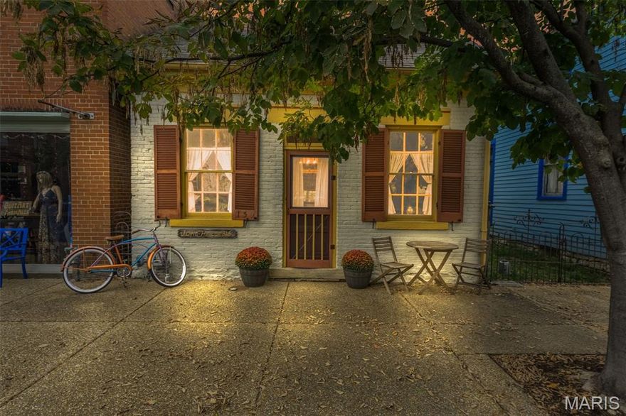 Don't miss out on this passive income-turnkey airbnb property!  Own a piece of history in downtown Ste Genevieve.  This charming "Little brick house" know as the Hael House was built in 1856.  The original home of John and Francesca Hael in the 1860's. Consists of two bedrooms and one bath.  So much charm in this home.  Open Living dining area with wood floors throughout.  Quaint little kitchen area. Main level bedroom and large bedroom on the upper level.  Large level lot with a side porch.  This property is currently an income-producing property being used as an Airbnb. Can be a turn key property.  Enjoy all the amenities with old world charm.