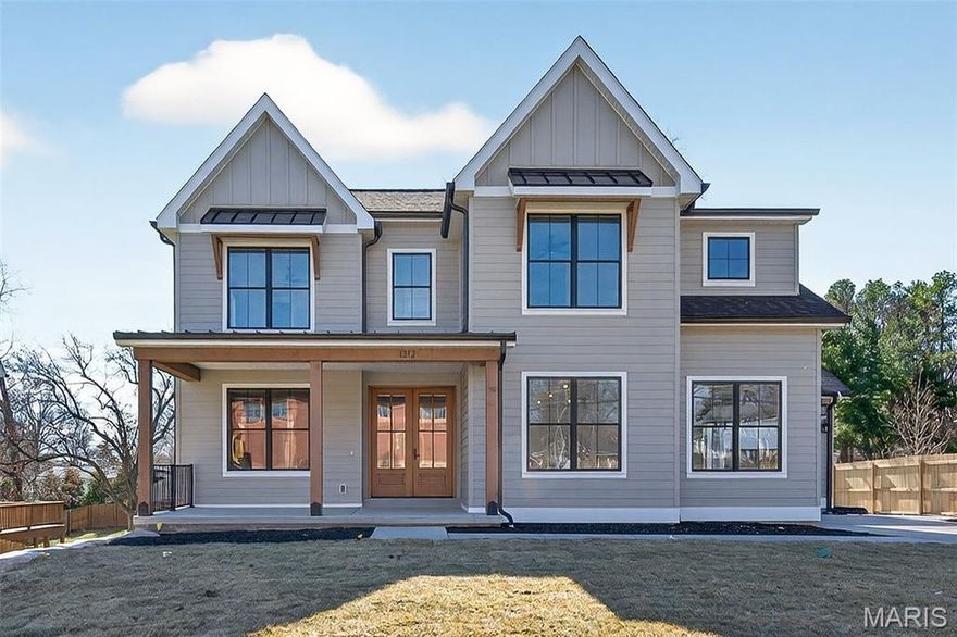 New beautiful home under construction featuring 5 bedrooms and 5.5 baths, with over 5,200 square feet of living space, including a walkout lower level and three-car side entry garage. The open floor plan showcases custom finishes throughout. The kitchen includes all-wood custom cabinetry, quartz countertops, a walk-in pantry, and upgraded appliances with a large 12’ sliding door connecting to a covered deck overlooking the large level yard. Retreat to the luxurious primary suite, complete with a spa-inspired bath offering an oversized shower, soaking tub, dual vanities, quartz counters, and an oversized closet with a St. Louis Closet System. Additional highlights include three separate ensuites with walk-in closets, 9’ ceilings throughout, 8’ solid core doors, fiberglass windows, and custom built-ins throughout.