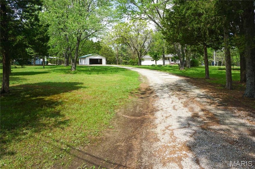42.10 m/l Acres Near the Gasconade River – Land, Privacy & Opportunity! The true value of this property is the 42.10 m/l acres offering space, privacy, and endless potential. Ideal for recreation, hunting, hobby farming, or simply enjoying a peaceful country setting near the Gasconade River.

The ranch-style home features 912 m/l sq ft with 3 bedrooms, 1 bathroom, an eat-in kitchen, attached 2-car garage, and full unfinished basement. Includes oak cabinets, propane oven/range, dishwasher, refrigerator, built-in microwave, washer/dryer connection, well water, propane high-efficiency heat, and central air. Outdoor furnace is not currently hooked up.

Additional improvements include a 36x55 m/l shop with two overhead doors and 11 ft m/l ceilings, a 16x40 m/l lean-to, and a detached 2-car garage. Seller to credit buyer $8,030.00 for new roof. Roofing bid will be shared with buyer.