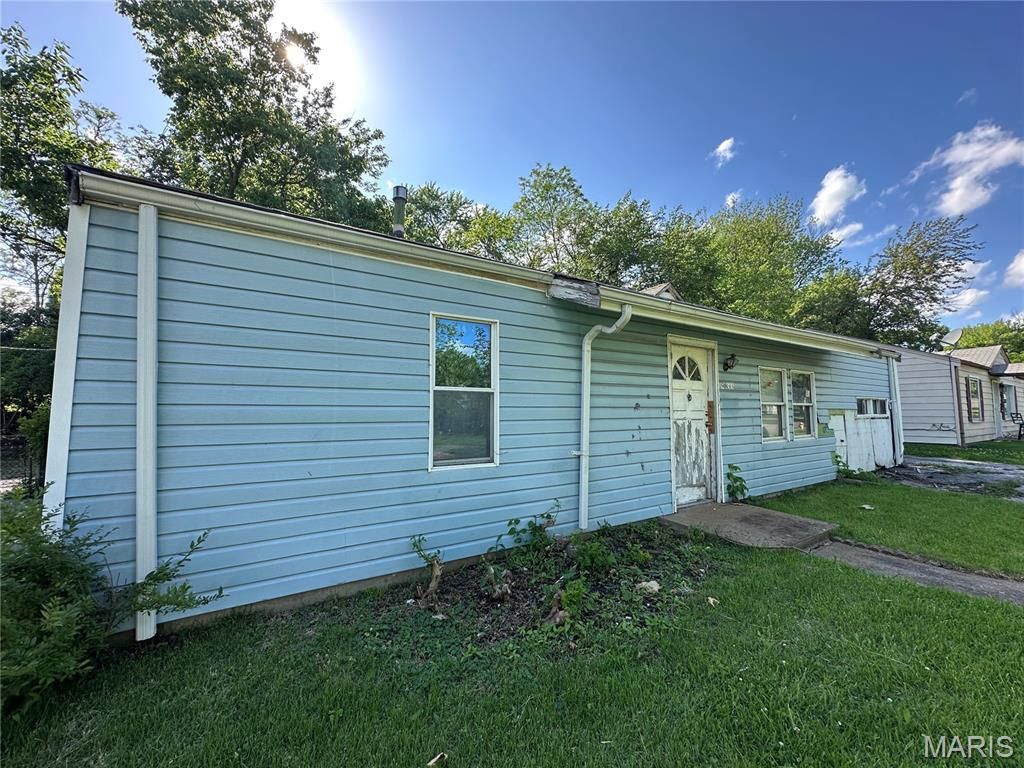 Photo of 9833 Dennis Drive, Riverview, MO 63136 (MLS # 25079199)