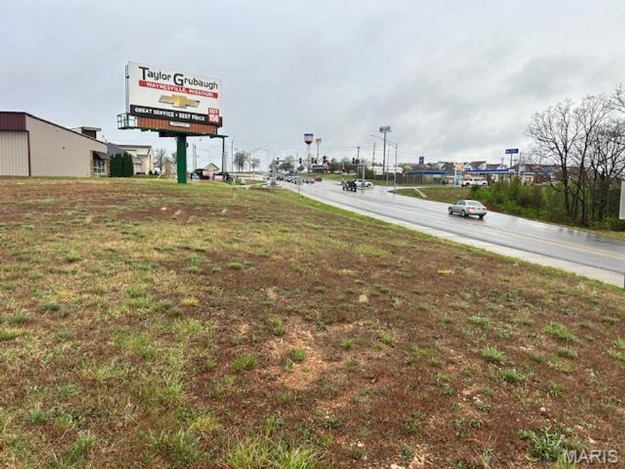 This prime 0.15-acre lot is ideally located on Highway Y, offering approximately 200 feet of valuable highway frontage and exceptional visibility from the busy intersection at St. Robert Blvd. Positioned in a high-traffic area with strong daily exposure, the property is surrounded by established restaurants and retail stores, making it a highly desirable location. This site is cleared, eliminating costly site preparation and allowing for immediate development. High-visibility lots in this growing area are limited, making this an outstanding opportunity to secure a premium location. 

Property is subject to a billboard easement. Billboard structure and associated rights are not included in the sale.