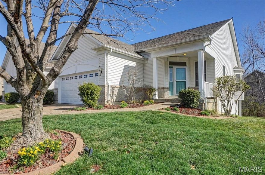 Enjoy the best of resort-style living in this traditional  villa located within the gated 55+ community of Heritage of Hawk Ridge. Designed for both comfort and sophistication, this home offers a seamless blend of modern upgrades and active-adult amenities. Step inside to a bright, open floor plan accentuated by gleaming wood floors and a flood of natural light. The heart of the home is the expansive kitchen, which has been thoughtfully updated with brand-new KitchenAid appliances and a convenient eat-at bar—perfect for casual mornings or hosting friends.The living area features a cozy gas fireplace, creating a warm ambiance that flows directly into the screened sunroom. This tranquil outdoor retreat allows you to enjoy the fresh air in total comfort.The spacious primary bedroom features an en-suite bathroom with a double vanity, large walk in shower and generous closet space. An open staircase leads you to the walk-out lower level. This partially finished space is bathed in light and offers a full bathroom, abundant storage and a large space for recreational activities or gathering to relax. With direct access to the outdoors, perfect for indoor-outdoor entertaining. Living in Hawk Ridge means more than just a beautiful home; it’s a vibrant lifestyle. The secured, gated community handles the hard work for you, including yard care, road maintenance, and snow removal. A few highlights include a golf course, a club house with year round social activities.   Take a dip in the sparkling pool or join neighbors for tennis, pickleball, or bocce.