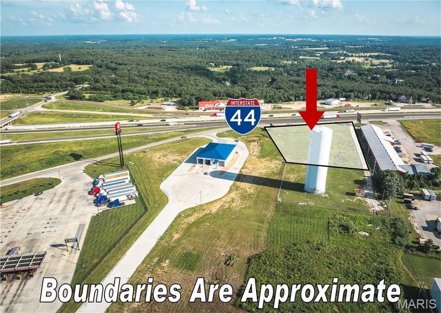 This 2.14 m/l acre commercial lot is located just off I-44 at Exit 189 in Rolla, Missouri, with direct access from Enterprise Drive and positioned immediately next to the newly developed QuikTrip Travel Center. Situated adjacent to the Hy Point Industrial Park area, the property benefits from proximity to a well-established commercial and industrial hub. Zoned C-2, it allows for a variety of commercial uses including retail, restaurant, office, drive-thru, and auto-related services. The lot is cleared, level, and ready for development, with utilities available. While a few miles from Rolla’s main business loop, this site serves as a busy stop for interstate travelers. Neighboring businesses like Love’s, McDonald’s, Subway, and QuikTrip draw steady traffic from I-44, offering excellent visibility and convenient access for highway-oriented development.