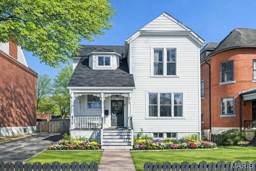 Fall in love with this fully renovated and meticulously restored historic beauty in the heart of Southwest Garden! This elegant hone offers 3 bedrooms, 2 bathrooms, and nearly 2,000 sq ft of light-filled living space—all situated on an exceptionally large, park-like lot. Step through the charming front picket fence and onto the welcoming front porch overlooking a picturesque street. Inside, you'll find the irreplaceable charm of old-world craftsmanship paired with extensive updates including  windows, doors, flooring, roofing, plumbing, electrical, HVAC, AC, water heater, fixtures, and more. The beautifully renovated kitchen boasts custom cabinetry and quartz countertops. The convenience of main-floor laundry enhances everyday living. Outside, the huge fenced yard is an urban oasis with a partially covered composite deck, fire pit, and room for endless activities. Located in a walkable area just minutes from Tower Grove Park, The Hill, major highways (44 & 64), Forest Park, top-tier hospitals, and restaurants, this home delivers convenience and neighborhood charm.