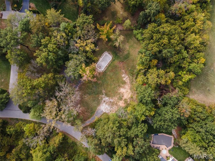 Rare opportunity to purchase a nearly 2 acre (1.83) lot in the heart of Ladue, perfectly situated off Barnes Road.