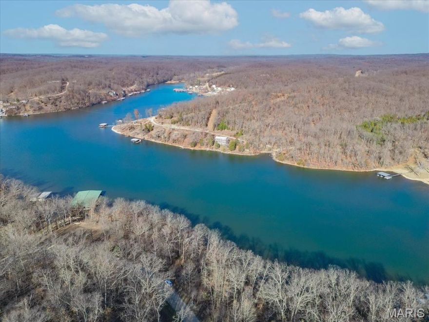 Come Check out this Lakefront 1.3 Acre lot located at Eagle Bay Subdivision in Gravois Mills MO! This Lot is already equipped with a wooden dock with a 10x20 slip. Not only is this a wonderful lot in a great subdivision, it has been cleared and is ready to be built on. With 226 ft of lakefront on the quiet waters at the 55 mile marker yet still close to waterfront restaurants and town. Central sewer and central water are in place. Schedule a tour, take the plunge and build your Dream Lake Home! Additional Rooms: Other
