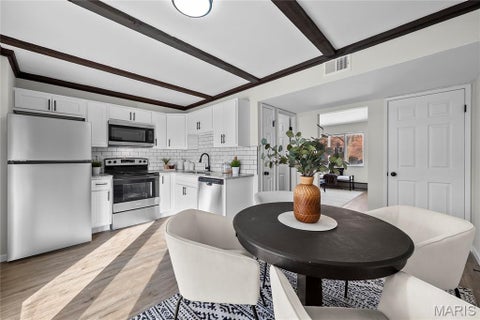 Photo of 10587 Carroll Wood Way, St Louis, MO 63128 (MLS # 26068948)
