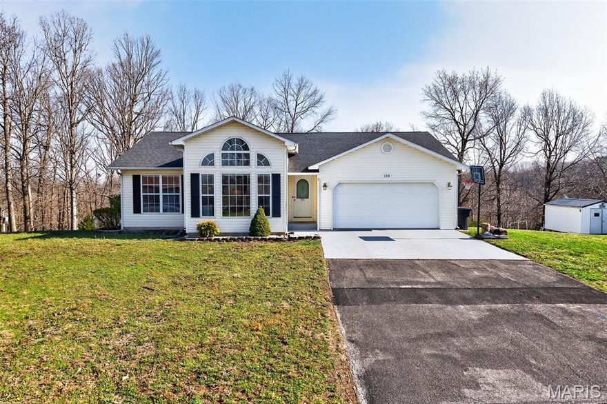 Are you looking for a move-in ready 4-bedroom home? 115 Saw Mill features a well appointed ranch over basement, a 2-car garage, and a spacious yard with mature trees. This home offers exceptional comfort and style, starting with luxury vinyl plank flooring throughout the living room, kitchen, dining area, and entryway, along with fresh paint and newer carpeting in the bedrooms and lower living space.
The kitchen is beautifully appointed with solid oak cabinetry, elegant granite countertops, stainless steel appliances, and a convenient snack bar—perfect for casual dining or entertaining. The dining room is generously sized and showcases custom-designed windows that fill the space with natural light.
The living room boasts a vaulted ceiling, creating an open and inviting atmosphere. The primary suite offers both space and privacy, complete with a walk-in closet and a modern en-suite bathroom featuring a double vanity, new flooring, and a custom tile walk-in shower.
Two additional main-floor bedrooms are well-sized and share a full bathroom. The finished basement expands your living space with a large family room, a cozy gas-insert fireplace with a tiled surround, an additional bedroom, a full bathroom, and a dedicated storage room.
Head outside to a fenced yard, with wooded view, a deck for barbecuing and entertainment, along with a flat yard space, perfect for a trampoline, pool or fire pit! 
Located in a serene subdivision just off of Hwy Y in St Robert, this home provides privacy without sacrificing the convenience to I-44, Fort Leonard Wood and town!