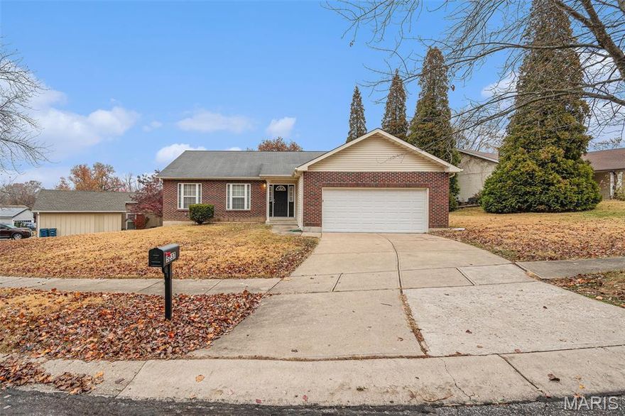 Welcome to this fantastic, move-in ready, 3-bedroom, 2-bathroom home with a 2-car garage in Florissant.

Upon entry, embrace open-concept living with cathedral ceilings soaring over the main living area and kitchen. The living area is cozy and inviting, featuring a fireplace and easy access to the back deck.

The primary bedroom includes an ensuite bathroom with a shower/tub combo and dual sinks. This home offers a large unfinished basement, perfect for storage or with great potential to be finished out as a secondary living space or game room.

The neighborhood is quiet and just minutes from schools, parks, and all the essentials. Schedule your showings today!