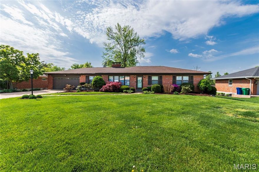 Welcome to this beautifully updated ranch home located in sought-after Sunset Hills within the Lindbergh School District. Situated on an approximately half-acre level lot, this 3-bedroom, 3-bath residence offers approximately 3,000 square feet of living space. The main level features an updated kitchen with custom cabinetry, granite countertops, a center island, and stainless steel and black appliances. A spacious dining room opens seamlessly to the living room, creating an ideal layout for entertaining. The adjacent family room includes a cozy wood-burning fireplace and overlooks the expansive, beautifully landscaped backyard filled with vibrant flowering plants and mature greenery. The primary suite offers a partially updated full bath, while the main floor also includes a convenient laundry room. Gorgeous hardwood floors and a professionally painted interior enhance the entire main level. Additional highlights include six-panel doors, an oversized two-car garage with an insulated door, an updated air conditioner, high-efficiency furnace, 200-amp electrical panel, and an architectural roof. The mostly finished walk-out lower level provides excellent additional living space, featuring a sleeping area, full bath, workshop, utility/laundry area, and a bonus recreation room with a second wood-burning fireplace. Enjoy outdoor living from spring through fall in the beautifully manicured yard. Relax on the large patio—perfect for morning coffee or evening gatherings—while taking in the serene backyard setting. Conveniently located just minutes from Highways 270 and 55, and close to hospitals, shopping, dining, and schools. This move-in ready home is ready for its next owners to enjoy. Buyer to verify all measurements and school district.