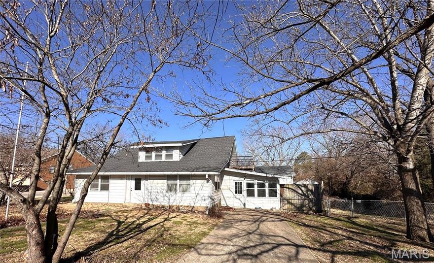 Check this out this five bedroom, two bath 1.5 story home, with large 14x30 tiled sun room, storm shelter, 12x12 deckoverlooking the fenced in back yard, a two car detached garage, with workshop area, and Central AC/Central Electric Heat. Home has living room and formal dining room with hardwood floors. Two bedrooms, and an office/ 6th bedroom located on the main floor, and three bedroom, and bath upstairs. $179,900 Additional Rooms: Sun Room