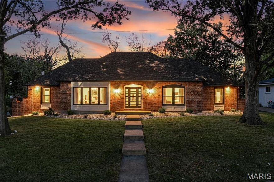 Step into this refreshed mid-century jewel in the Bennett Avenue Historic District, proudly listed on the National Register of Historic Places. This four-bedroom, four-bath home has been updated for modern comfort while honoring its iconic mid-century character. The open living area flows from the living room to the dining area and kitchen, creating an ideal space for entertaining or everyday life. Four well-proportioned bedrooms offer versatile spaces for a home office, guest suite, or hobby room, while maintaining privacy and cohesive flow. Updates include new finishes, modern lighting, refreshed flooring, and updated baths, so you can move in with ease and enjoy mid-century charm. The fully finished lower level adds living space for media, recreation, or fitness, with tasteful details and smart storage. A clean, low-profile two-car garage provides secure parking and extra storage, keeping living areas uncluttered. The modern kitchen features 42" custom cabinets, updated commercial-grade stainless steel appliances, and quartz countertops that honor mid-century lines while delivering today’s functionality. Large windows and thoughtful sightlines invite abundant natural light and a strong connection to the outdoors, true to mid-century modern ethos.