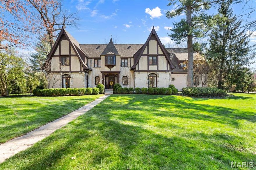 Welcome to this enchanting storybook Tudor home in one of Ladue’s most coveted neighborhoods. Upon arrival, you’ll immediately appreciate the fine craftsmanship, timeless architecture, & meticulous attention to detail. A grand entry welcomes you with a light-filled living room on your left with elegant millwork & an oversized fireplace. The well-appointed dining room is conveniently located next to the remodeled kitchen, boasting newer appliances & a spacious center island. Off the kitchen, a comfortable family room with built-ins provides the perfect gathering space for today’s lifestyle. Adjacent to the kitchen, a delightful sunroom with walls of windows overlooks the serene, lushly landscaped backyard & sparkling pool. Upstairs, you’ll find four generously sized bedrooms & three full baths. The expansive primary suite features two closets, fireplace, & a spa-like bath with steam shower. Walkable to top-rated schools, boutiques, & dining in downtown Ladue, this home truly has it all! Additional Rooms: Wine Cellar