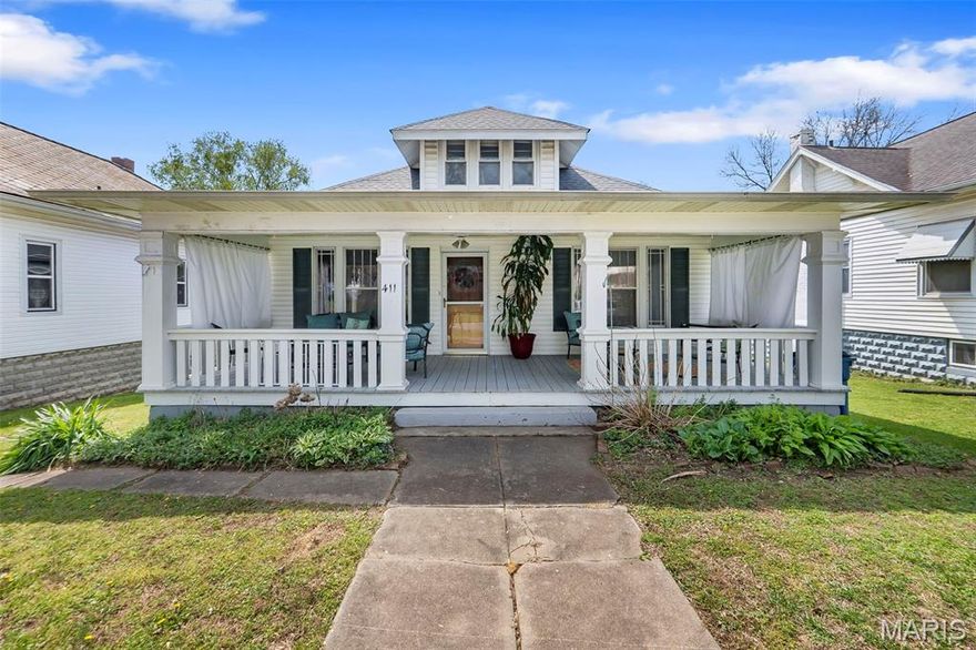 HOME SWEET HOME! Look what’s blooming this Spring …. Charming Craftsman home
with many original Craftsman features including some gleaming wood floors, significant wood
window and door trim, beautiful built-in wall china cabinet, high ceilings, original door knobs, window transoms and more  * Take
your pick rocking those cares away on your splendid front porch or oversized back porch *
NEW ROOF 2026 * Updated Furnace, Water Heater and Electrical Panel *  Future possibilities perhaps for finishing attic space - nothing extra special to write home about in
the attic at the moment, but with your vision, extra living space could be yours (you’ll see a
piece of drywall hanging from the attic ceiling - no roof leak, just been that way for years) *
You’ll also love the 2 car detached garage in the fenced in back yard with alley access * The
property is being conveyed AS IS , so Cash and Conventional only please.