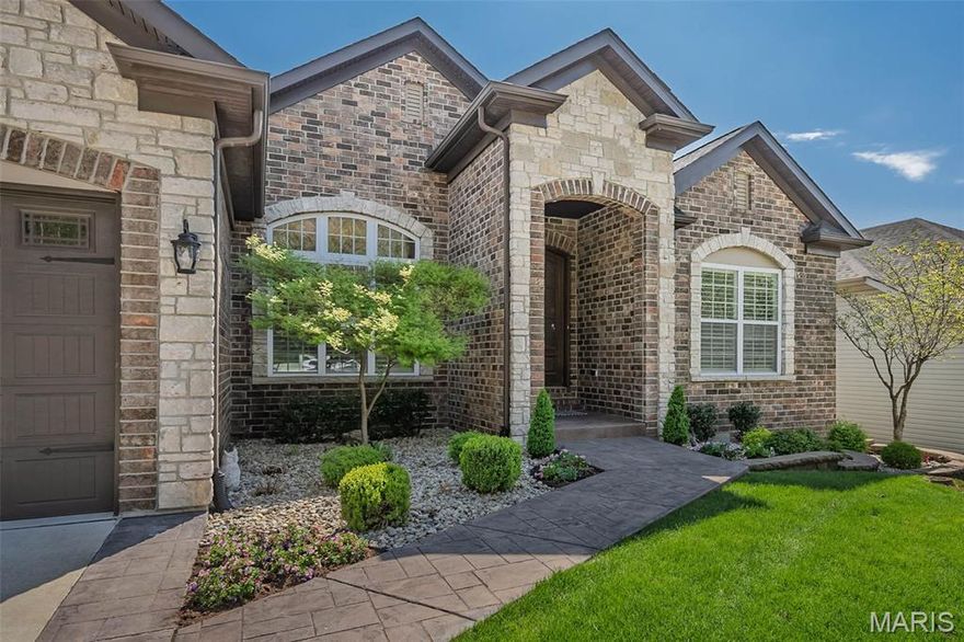 Welcome to 342 Harbor Bluff Dr – a beautifully designed 5-bedroom, 3.5-bath custom home in the gated Harbor View community in Fenton.  With over 4,000 square feet of finished living space, this 10-year-young ranch offers the perfect blend of style, comfort, and functionality.  The open-concept layout features a bright, airy kitchen with premium stone finishes, generous counter space, and seamless flow into the great room—ideal for entertaining or everyday living.  Soaring ceilings and abundant natural light create a warm, inviting feel throughout, anchored by a stunning floor-to-ceiling stone gas fireplace with hearth—an eye-catching focal point for the space.  The main level includes a rare 4-bedroom ranch layout, highlighted by a spacious primary suite with a spa-like bath and dual custom closets. Built-in closet systems throughout the home provide exceptional organization and storage.  The finished lower level expands your living space with a 5th bedroom, full bath, large recreation area, home theater space, wet bar, and ample storage—perfect for guests or entertaining.  Step outside to enjoy a stunning view from the composite deck just off the kitchen, leading down to a beautifully designed custom brick and stone patio, fire pit, and full fencing.  Additional features include an oversized 3-car garage with epoxy flooring, professional landscaping, and wooded common ground views across the street.  Located in a quiet gated community with access to the Meramec River at George Winter Park, and just minutes from shopping and dining at Gravois Bluffs.  This is a rare opportunity to own a newer ranch home in one of Fenton’s most desirable locations.   Open House Sun 4/12, 1-4pm
