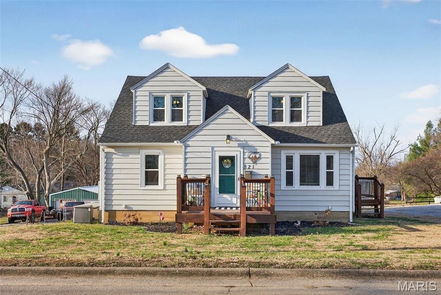 WHAT would you do with **SIX ROOMS?!?!?**.... Centrally located in Jackson on a deep *0.37-acre lot*, this doll house is Affordable Adorableness with So. Much. Space. 

The charming front deck welcomes you into a 1950 story-and-a-half home featuring a *14x19 naturally lit living room* with original hardwood floors. Flow into the *12x19 eat-in kitchen* with stainless steel appliances and access to a *wrap-around deck* — perfect for entertaining, grilling, or watching kiddos (and fur babies) enjoy the *fenced backyard*. Just off the kitchen a bright, 8-window, 12x6 room awaits — primary bedroom, sunroom, formal dining, playroom, or dreamy office? You decide.

The main level also includes two bedrooms and an updated full bath, tub/shower combo. Upstairs adds even more versatility with two additional bedrooms plus a bonus room ideal for an office, gaming lounge, playroom, or epic dressing room/closet space for an upstairs master get-a-way. (Easy access to add a bathroom upstairs through the main floor bathroom plumbing).

Don’t miss the hidden *side-entry garage* leading to a full *1,030 sq ft basement* with laundry — ready to finish and make your own or use for storage, hobbies, or workshop space, storage shelves included.

This home offers space galore – 4 Bedrooms and *2 Bonus Spaces*, spacious living room and kitchen, plus a full basement AND garage, whole home generator, efficient HVAC – electric with gas backup, and new roof (helps with insurance)!

Minutes from anywhere in Jackson and just 10 minutes to Cape or Fruitland. Sellers are graciously providing Home Warranty and leaving Blink Security Cameras!