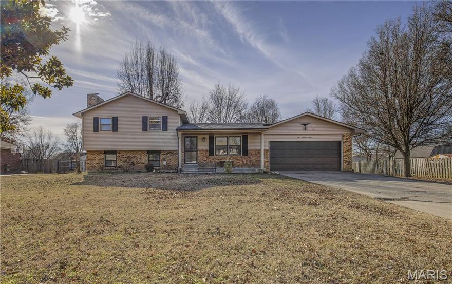 111 Holmes Dr. - where the big-ticket items are already done for you!  This split-level home with a basement features an updated kitchen with white cabinets, granite countertops, and newer appliances. Enjoy a spacious fenced backyard in a welcoming, family-friendly neighborhood.  Major improvements in the last four years include roof, HVAC, fascia, gutters, kitchen appliances, and custom barn wood laundry doors.  Stylish, functional, and ready for its next chapter.