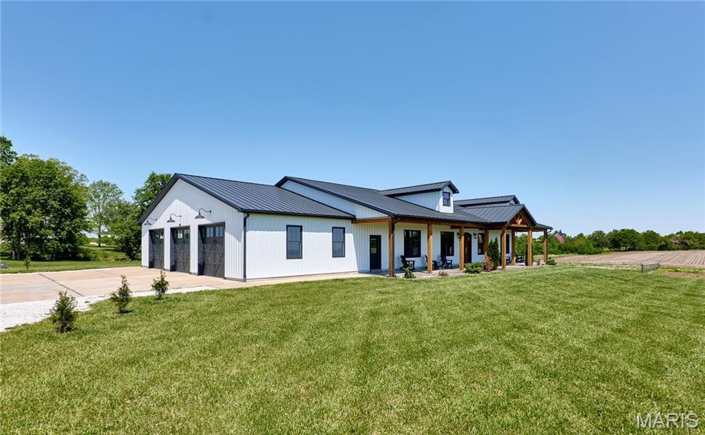 Photo of 705 S Ethlyn Road, Moscow Mills, MO 63362 (MLS # 26028750)