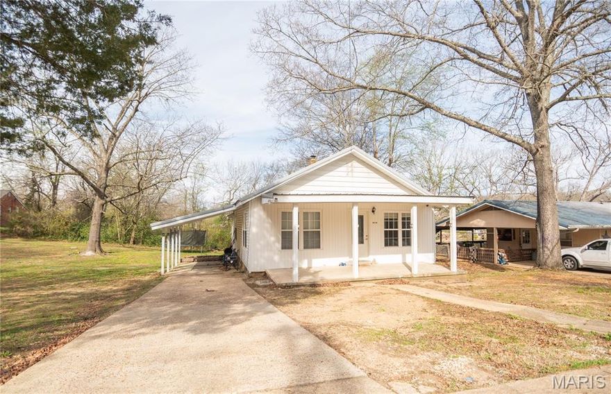 Welcome.... that is how you feel walking up to the covered porch, perfect for sitting and enjoying the beautiful outdoors. Inside, you will find an open floor plan with  3 bedrooms, 1 bath, dining area, and back porch.