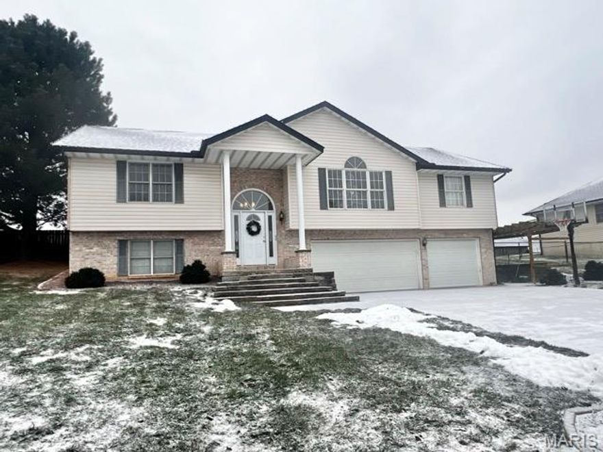 Welcome to this charming 3-bed, 3 bath home located on a quiet cul-de-sac in Hummingbird Estates. This move-in ready home features major updates including a new HVAC system, stove, fresh paint, carpeting, & a roof replaced within the last two years. Refinished wood floors highlight the dining room, with new hardwood floors extending through the entry, stairs, and spacious great room. The great room offers a cozy fireplace. Formal dining room located off the kitchen with a breakfast bar and stainless-steel appliances. A desirable split-bedroom floor plan provides privacy, with a generous primary suite featuring two walk-in closets, double vanity, jetted tub, and separate shower. Two additional bedrooms and a guest bath complete the main level. The lower level offers a family area with projector and screen, a sleeping area or office, full bath, laundry, and ample storage under the stairs. Enjoy the 3-car garage with side walk-out, large fenced backyard, and a playset - perfect place to call home.