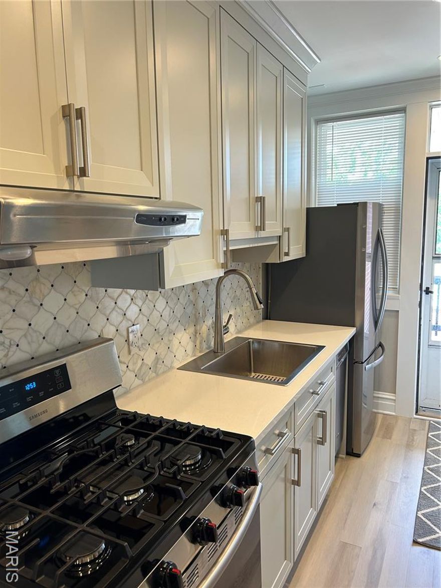 Available NOW! Beautifully updated 1 bed 1bath apartment with over 950 sq ft for lease and available now. The owners just remodeled this entire unit, everything is brand new! All new SS appliances, New kitchen cabinets and tile backsplash. New updated full bathroom, new carpeting, Fresh paint throughout all completed in 2024. This is a true GEM!  Very secure and private building with only 4 units. Security system in place.  One reserved garage spot with the unit. Storage & laundry in basement. Amazing backyard space which is fully fenced in. NO pets are allowed. No Smoking. This is truly a special place! Location: Upper Level