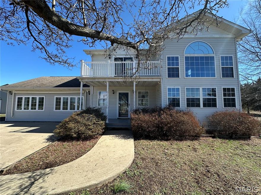 Discover this charming two-story, three-bedroom, two-bath home located at the edge of town, offering the perfect blend of privacy and convenience. Nestled on 3.13 acres, this property provides plenty of space to enjoy the outdoors, garden, or simply take in the peaceful surroundings. Inside, you’ll find an expansive family room ideal for hosting gatherings or relaxing with loved ones. The home’s layout is comfortable and functional, making it suitable for families of all sizes.A standout feature is the impressive 30’ x 40’ detached shop—perfect for hobbies, storage, or anyone needing extra workspace. This property offers room to grow, space to breathe, and the tranquility of country living with the benefits of being close to town.