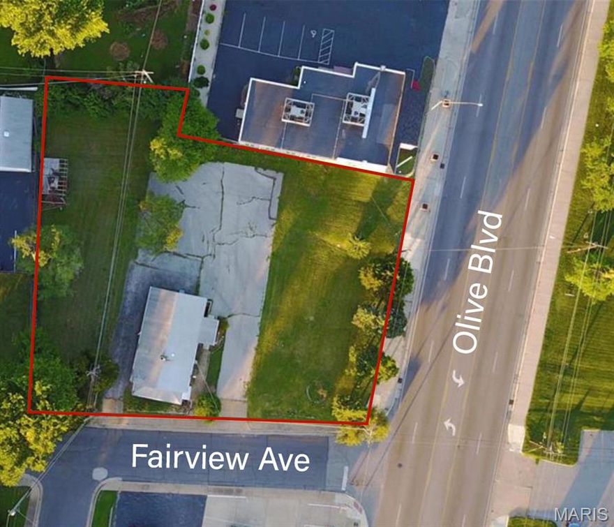 Prime commercial opportunity on Olive Blvd. Situated on a large, mostly clear lot with excellent frontage and visibility. This property includes a 2,000+ sqft building and ample parking for 20+ vehicles. The existing structure features multiple rooms, a kitchen and a walkout basement. Offering flexibility for a variety of business uses. With strong traffic exposure and a central location, this is an excellent opportunity for investors, developers or owner-users looking to renovate, repurpose or redevelop. Bring your ideas and capitalize on the possibilities.