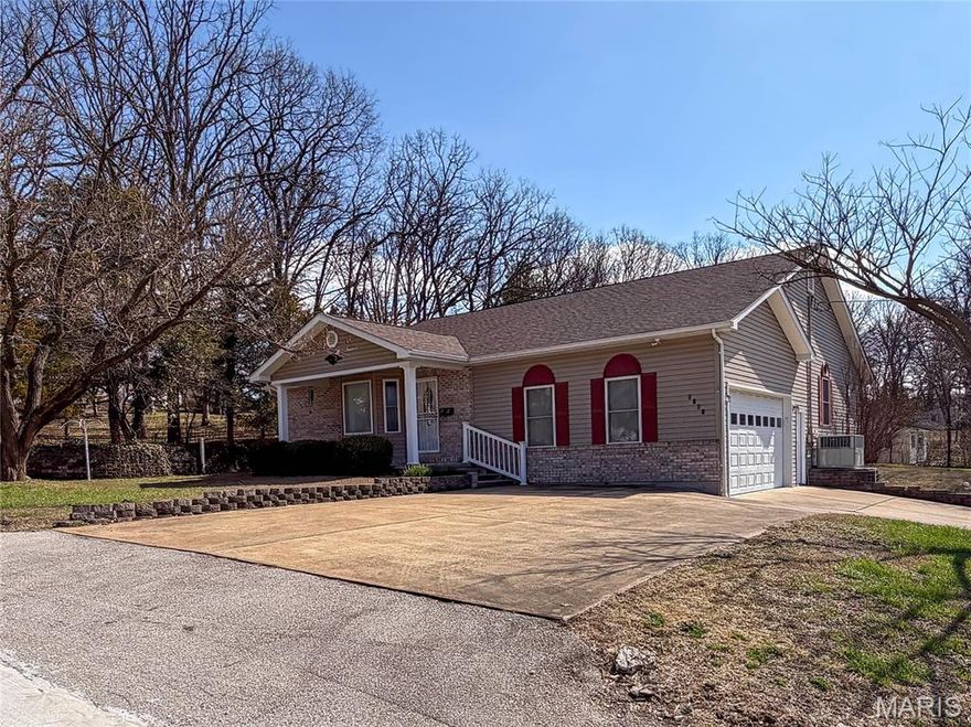 Charming, well maintained 2 bed, 2 bath home on a corner lot in the heart of Festus.  This home is conveniently located in a well established neighborhood, close to sought after Festus R-6 schools, shopping and dining. The handicap accessible home has extra wide treads on steps and widened doorways through out.  It features a main floor laundry, a large primary suite, spacious closets, a level backyard and a large (20x20) 4 season room for all your year round entertaining and relaxing.  The shed in the backyard has electric for your tools and projects.  Come take a look at this move in ready, 1620 sq ft home before its gone.
