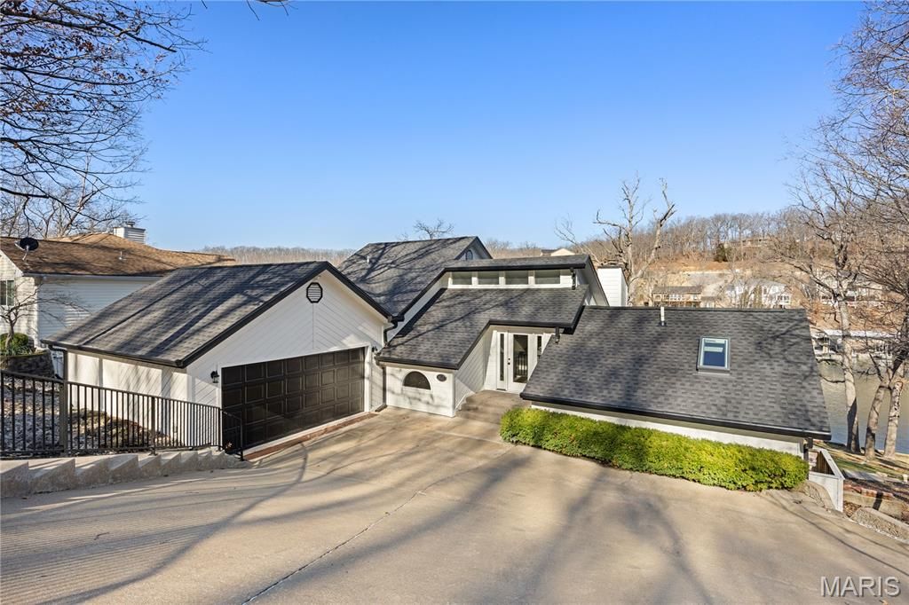 Photo of 310 Palisades Drive, Four Seasons, MO 65049 (MLS # 26002818)