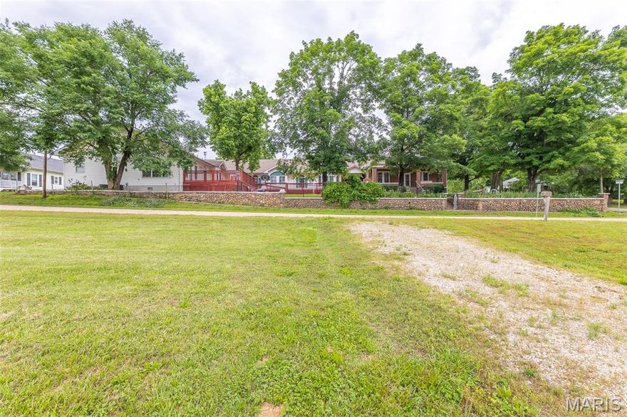 Exclusive opportunity to purchase this large, very nice facility at a fraction of what it would cost to build today. The original, brick home was built in 1900 making it one of the oldest, historic buildings in Annapolis, MO. This home offers 2 stories, a storage basement, 4 bedrooms, 1 1/2 bath, a balcony & is in incredibly good condition for its age. In 2003 a major, commercial addition was added consisting of 5400+ SF and was operated as a nursing home facility for several years & most recently a daycare facility. There are 5 private suites, 3 large double suites with 1/2 baths & hand washing stations in each, large common areas & a full bath with shower in common hallway.  The kitchen includes fridge, oven/range & a sanitation dept. approved, 3 vat stainless steel sink.  There are washer & dryer hookups in a common area room. There are 4, zoned HVAC units & 2 water heaters.  Safety & security features are all up to date & compliant with State licensing guidelines for nursing facilities or daycares. They include 24 hour alarm & door sensors, full sprinkler system, hard wired smoke detectors in each room, heat sensors in maintenance rooms, carbon monoxide detectors, handrails & wide doors for accessibility, 3 handicap ramps, widow guards for child safety & 5 EXIT doors with lit signage. Recent updates include new roof in 2020, new luxury vinyl flooring & paint throughout in 2023. Large decks, fenced playground area & 2 very nice storage buildings highlight the exterior.