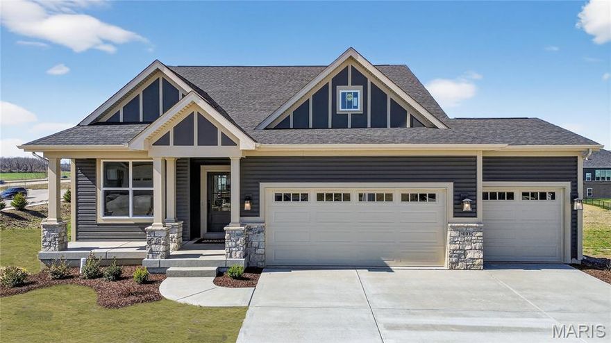 MOVE_IN READY! Discover timeless design and modern comfort in this Hamilton 2 located in the sought-after Cottleville Trails community. Thoughtfully designed with elegant finishes throughout, this home blends open-concept living with elevated details that make a lasting impression. Step inside to 9' ceilings on the first floor and a soaring 11' ceiling in the great room, creating an open and airy atmosphere. The great room features a 55" electric fireplace flanked by large windows, filling the space with natural light and warmth. The designer kitchen is the heart of the home, showcasing built-in double ovens, GE appliances, under-cabinet lighting, tall baseboards, and a butler’s pantry, perfect for entertaining. Glass doors at the flex room, can lighting throughout, and open stairs with metal balusters to the lower level add sophisticated architectural touches. Outdoor living is just as impressive with an expanded 20' x 10' deck overlooking a walkout homesite, ideal for enjoying St. Louis summers. An irrigation system is already in place to keep your lawn looking pristine. The walkout basement features a 9' pour, offering ample potential for future finishing. Located just minutes from downtown Cottleville and served by the top-rated Francis Howell School District, this home combines McKelvey craftsmanship with community charm and convenience.