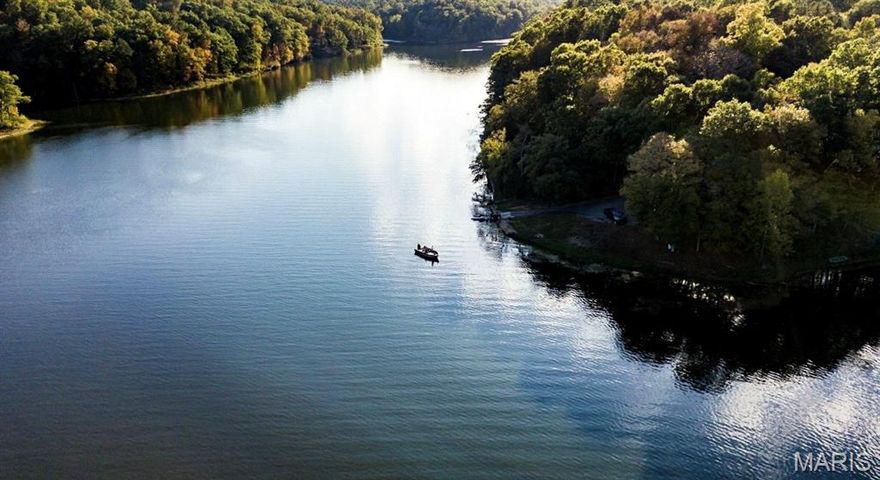 **BUILD OPPORTUNITY ON LAKE SKI AT GRAYHAWK** Discover the perfect place to build your forever getaway on this stunning 3.5 acre lake view lot nestled inside a private gated community in the heart of the beautiful and historic wine district of Ste. Genevieve, Missouri. Wake up to peaceful water views and spend your days enjoying not one, but two 100 acre boating and fishing lakes designed for adventure, relaxation, and everything in between. Cast a line at sunrise, take the boat out for an afternoon cruise, cool off at the community swimming pool, and gather with neighbors at lively community events that turn weekends into lifelong memories. All of this tranquility is just an hour from St. Louis, giving you the perfect balance of quiet lake living and convenient city access. Build the home you’ve always envisioned in a place where sunsets shimmer on the water and every season brings a new reason to fall in love.