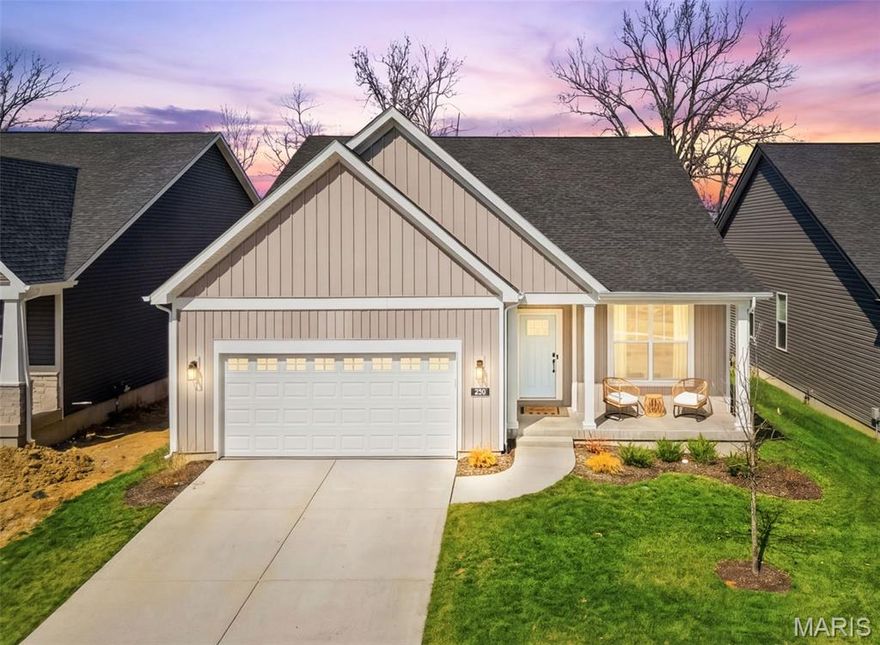 Why wait to build? This home is barely 1 year old and is close to everything families need. Discovery Ridge Elementary and Frontier Middle School are within walking distance, and Liberty High School is just a short drive away. With 2,064 square feet of living space, three bedrooms, and two bathrooms, this home was designed to balance comfort and style. The open-concept layout connects the kitchen, dining, and great room, making everyday living and entertaining seamless. The kitchen features quartz countertops, upgraded cabinetry, a spacious island, a butler’s pantry, and a full suite of GE appliances. The great room is home to a beautiful gas fireplace with a custom mantle, while luxury vinyl plank flooring throughout the main living areas enhances the home’s modern character. The owner’s suite offers a private retreat with a large walk-in closet and a spa-like bath complete with dual vanities and an oversized shower. Two additional bedrooms and a second full bath provide space for family or guests. The basement allows plenty of room for expansion with rough-in plumbing for future lower-level finishing, giving you the option to expand as your needs change. This a is a rare opportunity to own a 1 year old home for less than NEW CONSTRUCTION COSTS in one of O’Fallon’s most desirable communities.