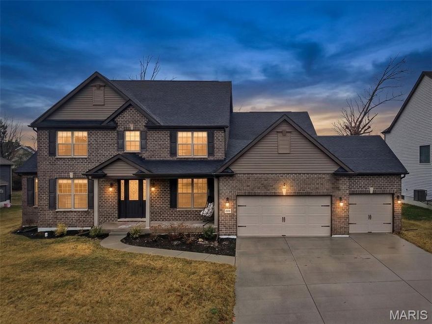 Welcome to this stunning 4-bedroom, 3.5-bathroom 1.5-story home offering luxurious finishes, an open floor plan, and exceptional design throughout. Featuring a beautiful east-facing brick elevation and impressive 9-foot front door, this home makes a striking first impression.
The breathtaking two-story great room is filled with natural light, recessed lighting, and remote-controlled solar-powered blinds. The open-concept layout seamlessly connects the great room, breakfast room, and kitchen, creating the perfect space for everyday living and entertaining.
The gourmet kitchen is a showstopper with an oversized center island topped with Quartz countertops, stainless steel appliances, double ovens, a 5-burner gas cooktop with range hood, and a refrigerator that stays. The adjoining breakfast room features a dramatic 9-foot sliding door that opens to the backyard.
Retreat to the main-floor primary suite offers a peaceful retreat, complete with a spa-like bath featuring dual vanities, a soaking tub, separate shower, and a massive walk-in closet. A formal dining room with a stylish accent wall provides the perfect setting for special gatherings, while the main-floor laundry and powder room add everyday convenience.
Upstairs you’ll find three spacious bedrooms, all with private bath access, plus a versatile loft overlooking the great room.
The unfinished lower level offers incredible opportunity for future expansion with 9-foot ceilings, egress windows, and a bath rough-in, allowing you to create the space that fits your lifestyle. Additional highlights include dual HVAC systems, a water softener that stays, an oversized 3-car garage, and a level backyard.
Located in a vibrant community with a pool, playgrounds, scenic walking trails, and ponds, this home is also part of the highly rated Wentzville (Liberty) School District and just minutes from highways, shopping, and dining. This is more than a home—it’s a place designed for living beautifully.