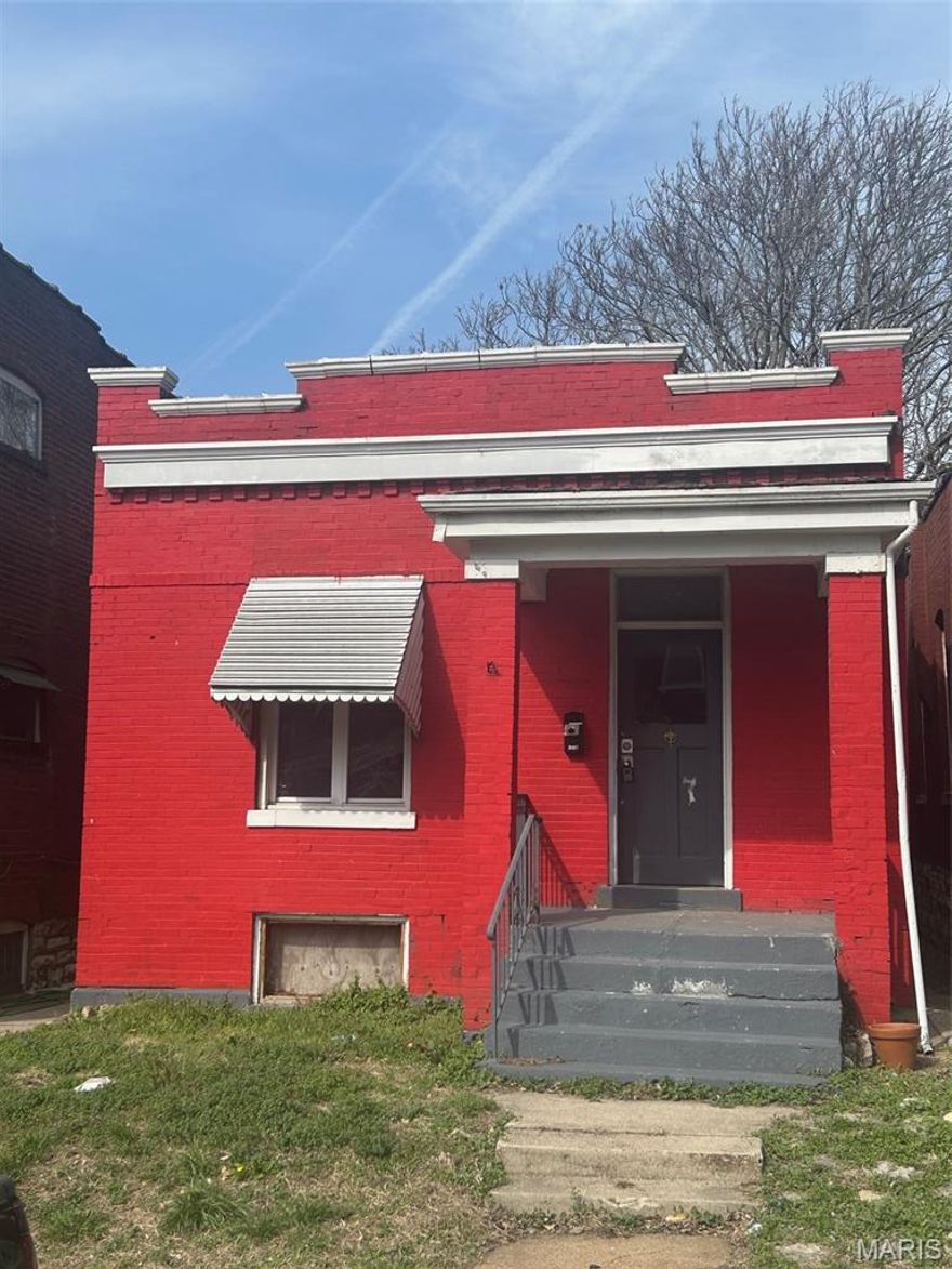 This 2-bedroom, 1-bath brick ranch offers a great opportunity for investors seeking a reliable addition to their portfolio. Ideally located just around the corner from Cherokee Street, tenants will love easy access to a vibrant mix of restaurants, bars, shops, and entertainment. The home features two spacious bedrooms, a comfortable living room with a fireplace, and a formal dining room—providing a functional layout that appeals to long-term tenants. The kitchen opens to a generously sized deck overlooking a private, fenced backyard, adding desirable outdoor living space. The bathroom includes ceramic tile flooring and a tiled surround with tasteful backsplash and a built-in medicine cabinet. A full basement provides ample storage or potential for additional value-add opportunities. With its durable brick exterior, strong location, and practical floor plan, this property is well-suited for rental income, light updates, or a buy-and-hold strategy. Property to be sold As-Is.