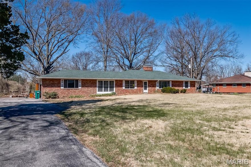 Fabulous full brick 3 bedroom 2 bath  ranch home waiting for some TLC.  This is an incredibly large lot and this home has endless possibilities!  Seller is selling AS IS and will do no repairs, warranty or inspections.  Please submit offers on a special sales contract with proof of funds. Please do your due diligence prior to submitting an offer.