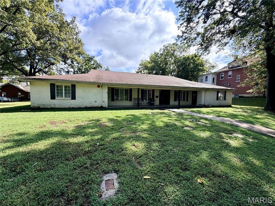 In the heart of downtown and just steps from dining, shopping, and campus life, this fully renovated 11-bedroom property offers a rare combination of size, location, and versatility. Formerly a medical facility, this solid, slab-built structure was completely transformed in 2020 into a high-demand sorority house, making it a proven income-producing asset for its current owners. Spanning over 5,100 square feet, the home features bedrooms thoughtfully arranged along the perimeter for privacy, while the center of the home offers a spacious living room, dining area, and oversized kitchen with a butler's pantry. A bright, inviting sunroom stretches across the back. With three bathrooms, one half bath, and two laundry rooms, the layout is designed for high occupancy and convenience. Situated on a generous lot with twenty-five parking spaces, this property is perfectly suited for group housing, co-living arrangements, student rentals, or even a conversion back into professional office or medical space. Whether you're an investor seeking strong rental income, an organization in need of housing, or a visionary ready to adapt this space to your unique use, this property offers unmatched flexibility in one of the most desirable locations in town. Property is owned by licensed Realtors.