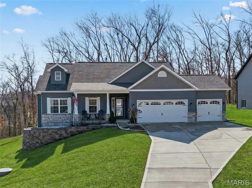 OPEN HOUSE SUNDAY CANCELED This Valentine's you will fall in LOVE with this beautifully crafted, nearly new 4-year-old home offering approximately 2,800 square feet of total finished living space! From the charming covered front porch to the welcoming entry foyer, this thoughtfully designed split-bedroom, open-concept floor plan blends comfort and functionality.

The main level features 3 bedrooms and showcases 9' ceilings, a stunning show stopping kitchen with granite-topped center island with farmhouse sink & seating overhang, 42" cabinetry, stainless steel appliances, a walk-in pantry, transom windows, open to the living room with floor to ceiling electric fireplace, and convenient main floor laundry off the kitchen. The spacious primary suite offers a luxurious bath with a separate soaking tub and shower, double bowl vanity, and a large walk-in closet.

The finished lower level walk-out adds an additional 1,144 square feet of living space, including a Game room, Exercise room, Family Recreation room, and a versatile sleeping area or home office, providing flexibility for today’s lifestyle needs. Water softener plus Water Filtration system. Complete with a 3-car garage, service door, 12'x12' deck, 14'x20' patio & gazebo included backing to the serene wooded very large homesite, this home offers exceptional space, quality, and modern craftsman design. Minutes from shopping, schools, & parks.