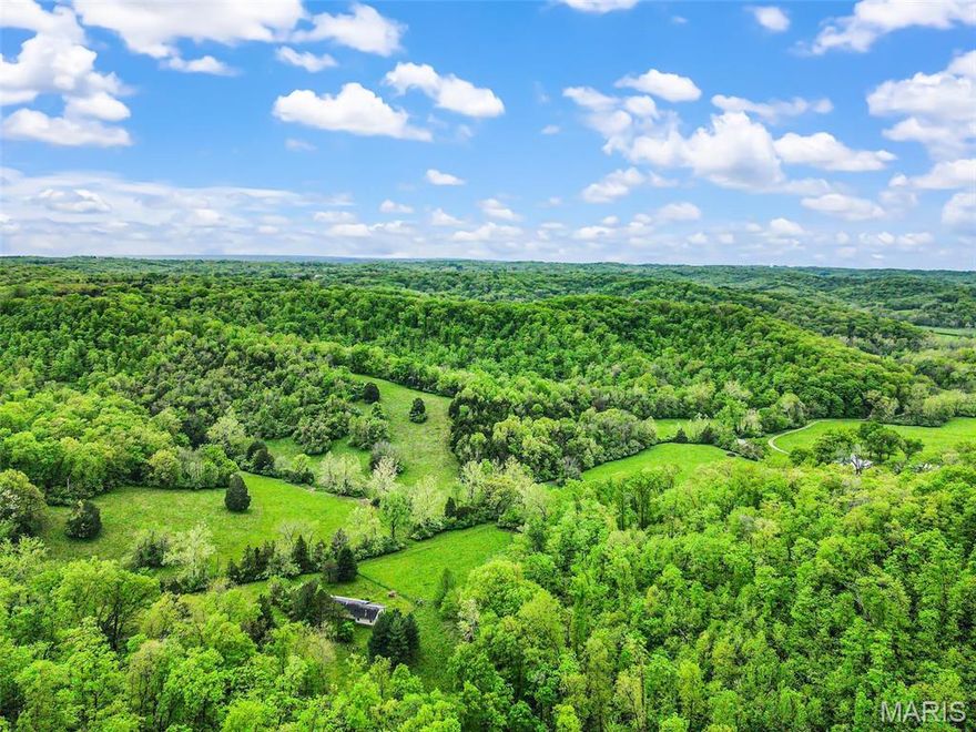 So secluded you'll feel like your in the pastures and hills of Missouri! Wait! You are! Tucked back among the valley lays this 56 acre parcel with an old frame home, more of a storage place or fixer upper. Second small parcel of 1.3 acre off Alt included. Has some fencing, older well and septic according to owner. This is in the very back of the property, this place is literally magical in its beauty with stunning homesites, hilltop views, wildlife, creek and solitude that's hard to find in gorgeous Labadie! Owner will be putting a restriction to limit just 2 homes to be built back here. This place is so incredible with blooming flowers, lush pasture and unspoiled nature!!! Large parcels are becoming harder to find in this special northeastern Franklin County area, with easy commutes to West County, Chesterfield, Washington, and I-44 and Hwy 100 is literally minutes.
 NOT THE WHITE 2 STORY ON THE LEFT, DO NOT DISTURB, ITS THE SMALLER TAN HOME END OF THE ROAD.