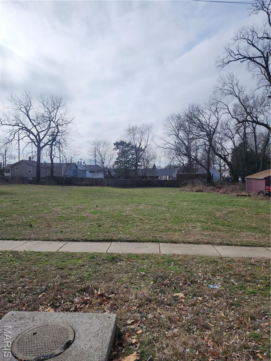 READY TO BUILD IN THE DESIRABLE ST. JOHN AREA? This land has been surveyed and building plans can be provided.
.29 acre building lot. It could be combined with the lot next door for more than .5 acre lot.