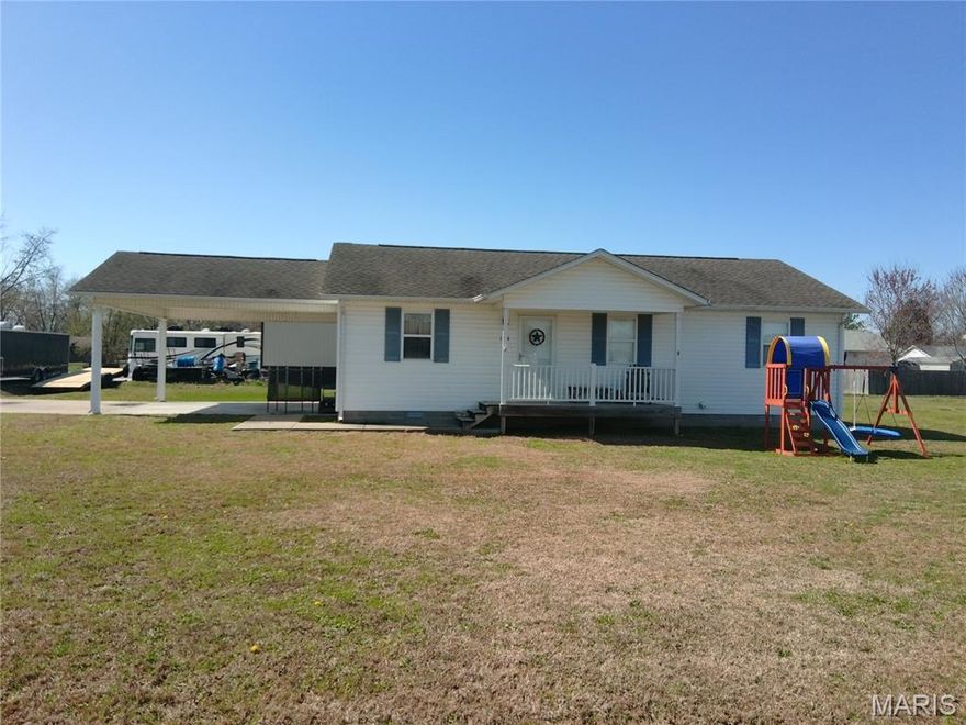 Ranch style home on corner lot. Three bedroom and one bath home. Galley kitchen with oak cabinets and snack bar. Large lot with deck in back.